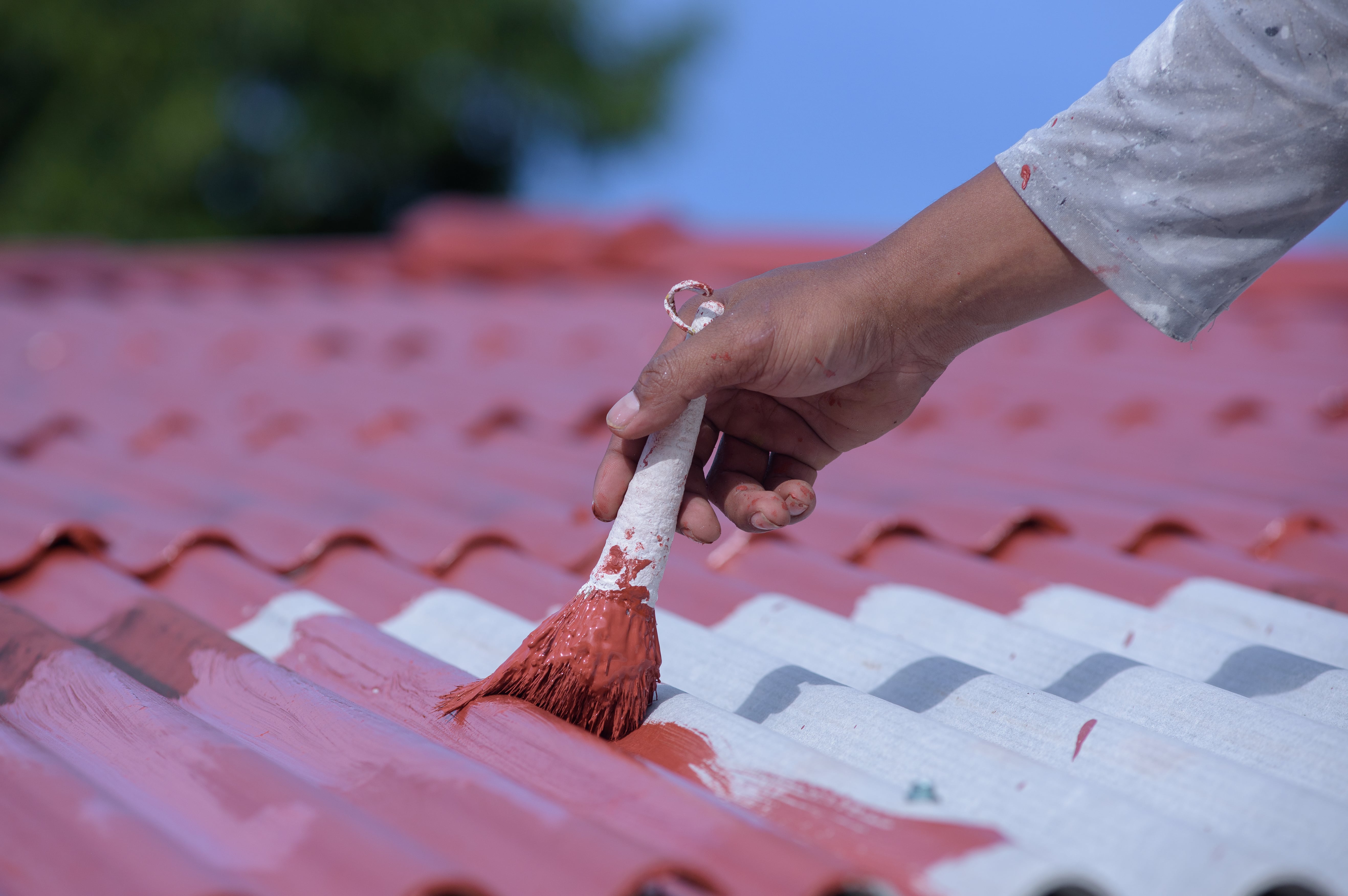 Image showing applying the first coat of ROOFRUBBER